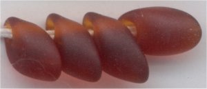 lma-0134-f - 4x7mm Long Magatama - Matte Transparent Dark Topaz (tube)