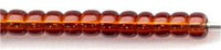 11-0134  Transparent Dark Topaz  11° Seed bead
